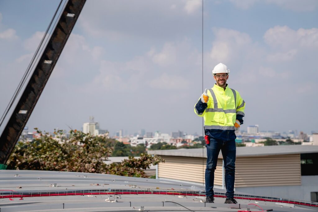 Service engineer checking solar cell on the roof for maintenance if there is a damaged part.