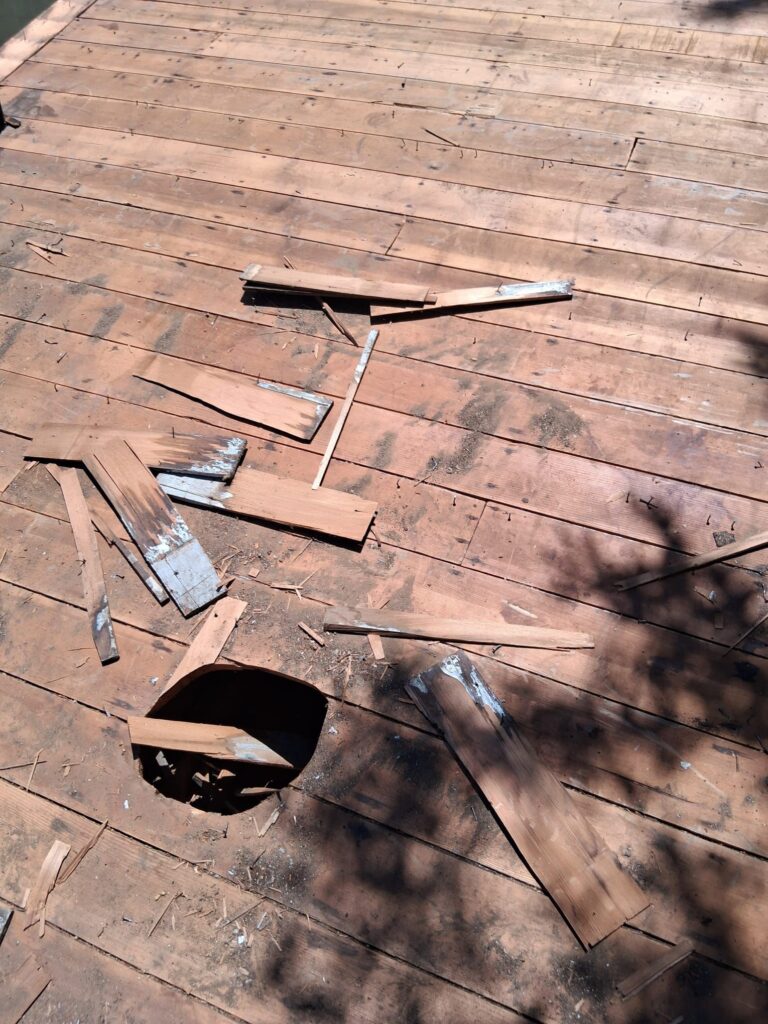 Damaged roof decking found during shingle tear-off