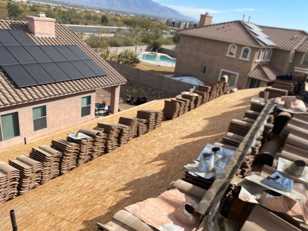 Tile roof deck with tile stacked for reset in the Phoenix metro