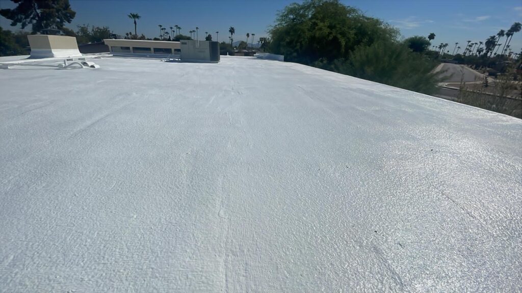 Completed foam and coating on a commercial flat roof