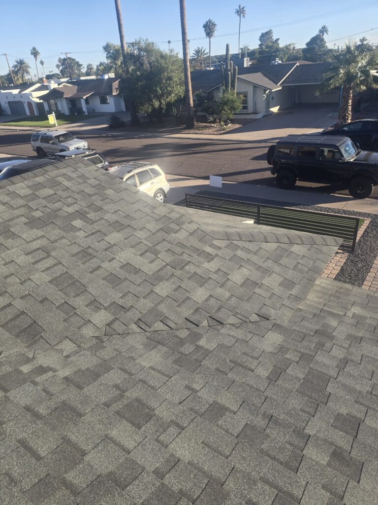 Asphalt shingle roof on a single-story home, Tip Top Roofing Service