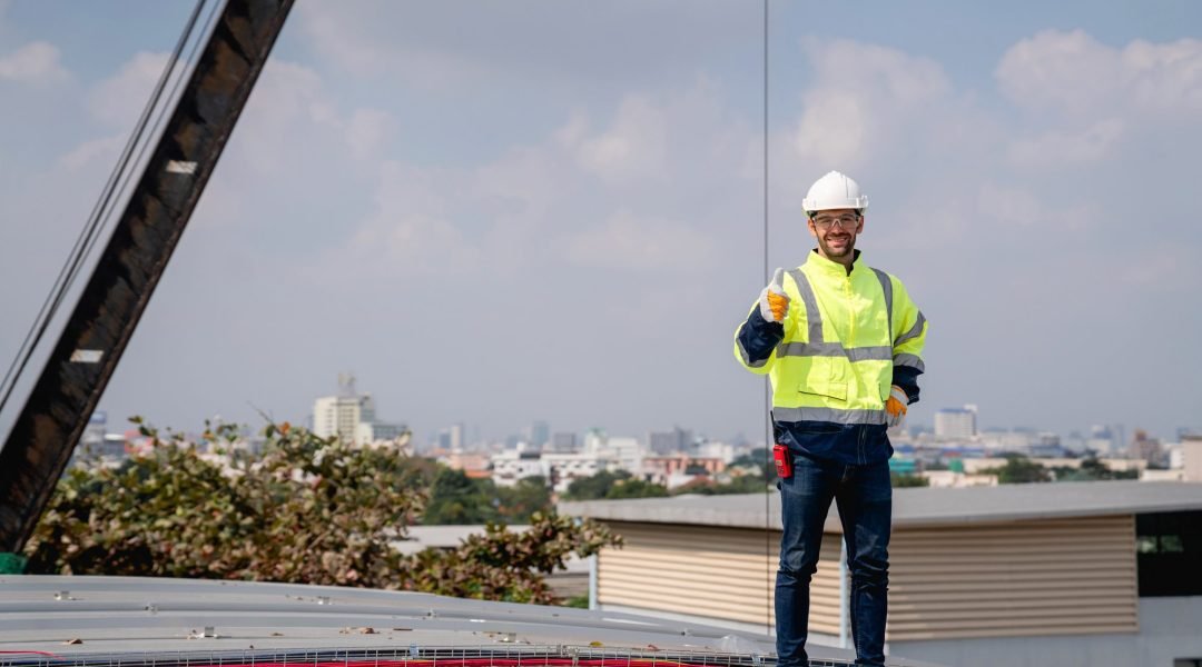 Service engineer checking solar cell on the roof for maintenance if there is a damaged part.